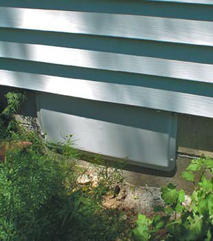 A gray crawl space vent cover in Gold Canyon