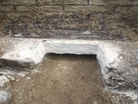 Preparing a foundation footing for helical pier installation in Benson