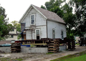 A severely damaged home foundation that is undergoing replacement in Thatcher.