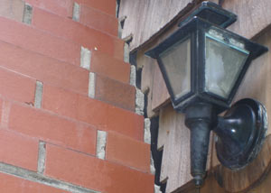 A tilting chimney in Gold Canyon showing serious foundation damage.