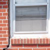 A gap in a window along the outer wall due to foundation settlement of a Eloy home.